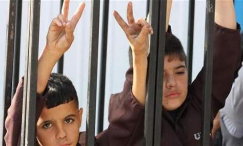 المصادقة على مشروع قانون يقضى بمحاكمة الأطفال الفلسطينيين